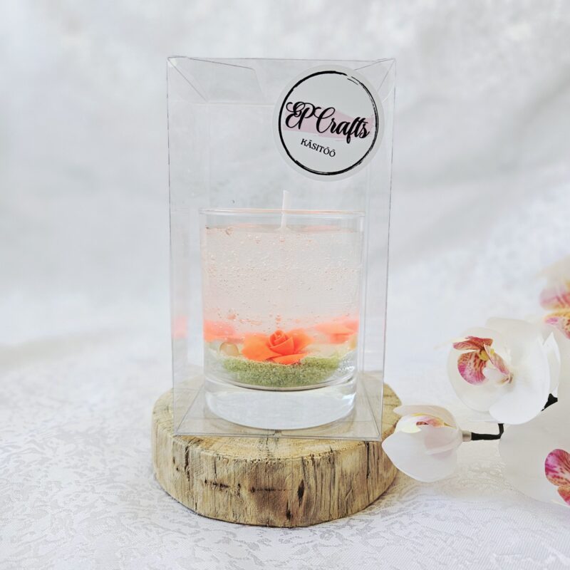 Geelküünal “Lilled” – käsitööna valmistatud dekoratiivne küünal klaasanumas, mille sees on lilled ja dekoratiivkivid.